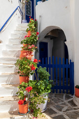 Fototapeta na wymiar Naoussa Greece. 06-07-2022. Street in Naoussa city at Paros . Cyclades Islands. Greece