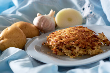 Homemade Hash brown potatoes, toppings on the side.