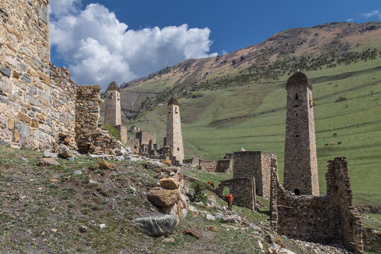 Ruins of an ancient Ingush mountain village with stone towers and houses, Ingushetia, Russia