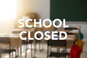 Text SCHOOL CLOSED and interior of classroom