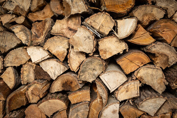 Stacked Pile of dry Firewood Logs Background