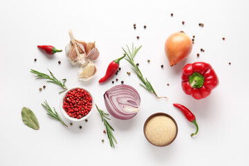 Composition with spices and vegetables isolated on white background