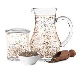Jug and jar of water with chia seeds on white background