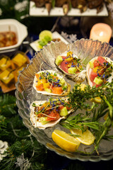 Tuna ceviche in a shell on the festive table
