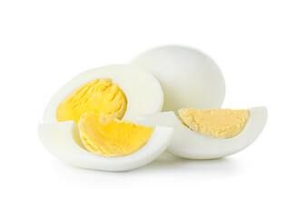 Pieces of boiled chicken eggs on white background
