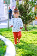 little child is playing on the playground in varna bulgaria 