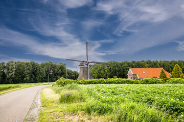 Groningen landscape with octagonal watermill de Fraeylemamolen on the Groenedijk in Slochteren, originally for drainage of the Grote Oosterpolder and now managed as Groningen heritage