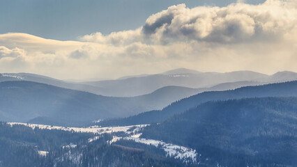 Obraz na płótnie Canvas Winter landscape - top view of the snowy mountain valley in the Carpathians, in Ukraine