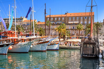 Coastal summer cityscape - view of the promenade the Old Town of Split with the Palace of...