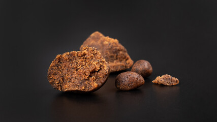 cannabis concentrate on black background, marijuana hashish.