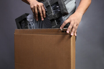 Close-up of a new laptop in its box.