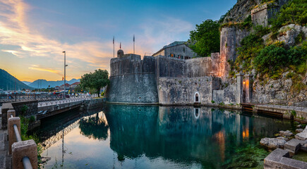 Panoramic view of south (Gurdic) gate, ancient fortress in Old Town of Kotor. Kotor, Montenegro. Evening panoramic view. - obrazy, fototapety, plakaty