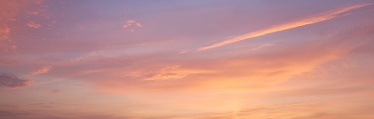 Clear blue sky. glowing pink and golden cirrus and cumulus clouds after storm, soft sunlight. Dramatic sunset cloudscape. Meteorology, heaven, peace, graphic resources, picturesque panoramic scenery - 516059075