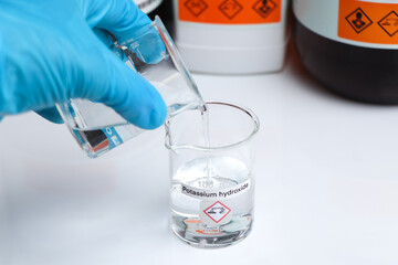 potassium hydroxide in glass, chemical in the laboratory