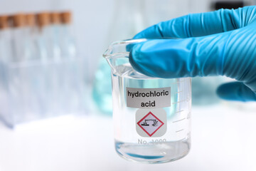 Hydrochloric acid in glass, chemical in the laboratory