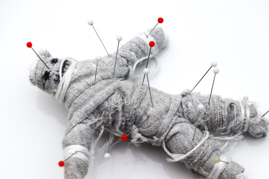 curse doll on background, religion and belief