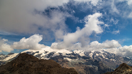 Summer trekking day in the mountains over Valtournanche