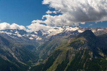 Naklejka premium Mountains over the town of Cogne, near Gran Paradiso National Park