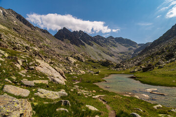 Fototapeta premium The beautiful mountains and lakes over La Thuile in a summer day