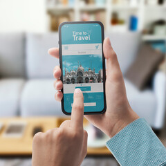Online travel booking app on smartphone
