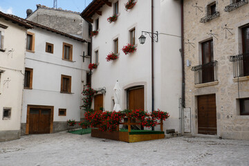 Fototapeta na wymiar Pescocostanzo - Abruzzo - One of the most beautiful tourist villages in Italy - The characteristic houses of the village