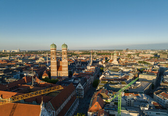 Obraz premium Wonderful Sunset Shining onto the Frauenkirche Towers in Munich, Germany
