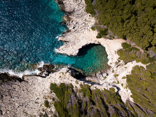 Italy, July 2022. Aerial view of the Quakes islands with their Caribbean sea