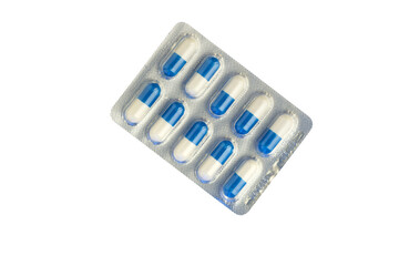 Blister with bright pills isolated on white, top view