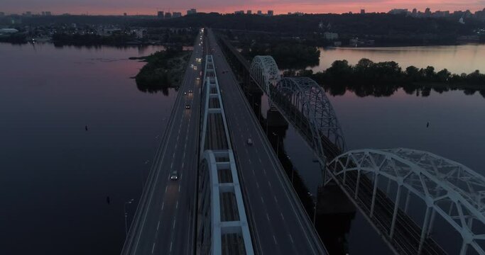 Sunset aerial view on a Darnitsky Bridge in Kyiv,Ukraine