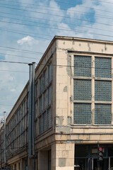 Fototapeta na wymiar Old and shabby industrial building.