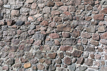 Old stone wall. Wall of the medieval castle.