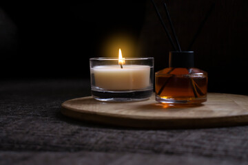 Fototapeta na wymiar Perfume for home, scented candle in the room
