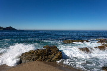 A view on the ocean with the rocks and waves