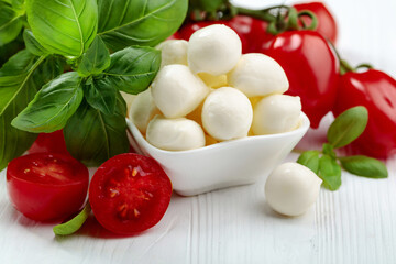 Mozzarella cheese with basil and tomatoes.