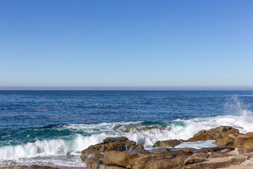 A view on the ocean with the rocks and waves