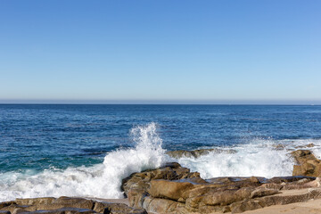A view on the ocean with the rocks and waves