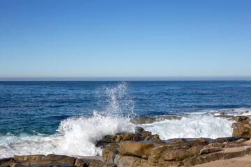 A view on the ocean with the rocks and waves