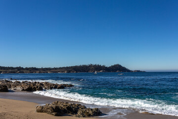 A view on the ocean with the rocks and waves