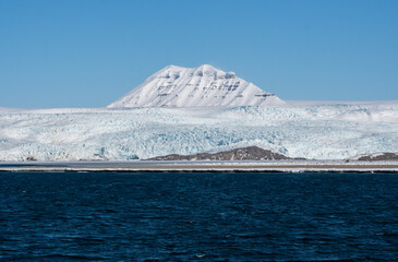 Panoramic view of the mountains, snow and Sea in Svalbard, Norway.