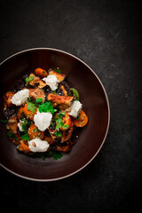 Warm Salad with crispy eggplant and tomatoes, cottage cheese, spices, herbs, sesame seeds, sunflower seeds, Georgian cuisine, no people,