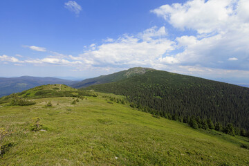 Babia Gora, Babia Hora, Beskid mountains, Slovakia, Poland. View from Mala Babia Gora. Mountains and hills in the sunny summer. Wide angle distortion with soft corners.