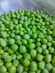 Green peas in a small bowl