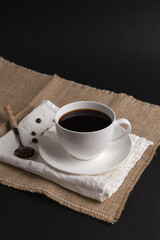 Obraz na płótnie Canvas Coffee cup classic white on a dark background