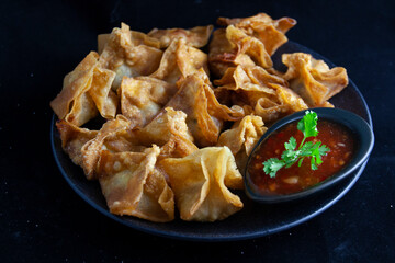 Fried Wonton  fried dumplings with sweet chilli dip sauce 
