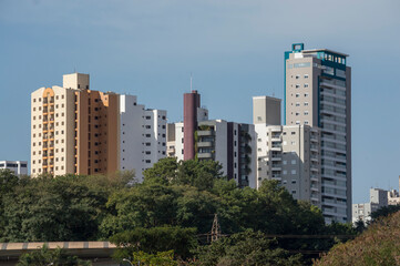 Fototapeta na wymiar An urban landscape, shows neighborhood with many buildings nearby, multifunctional buildings, close to parks and green areas, Piracicaba SP Brazil.