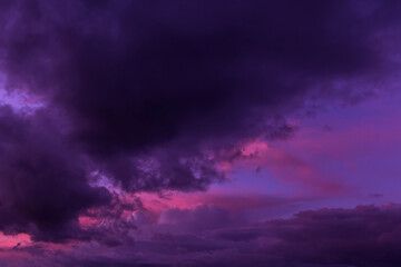 Fototapeta na wymiar Epic sunset sunrise pink storm sky. Dark blue violet cumulus thunderstorm rainy clouds background texture