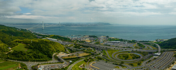 Panoramic aerial view of highway interchange and rest stop on Awaji Island
