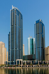 Naklejka na ściany i meble Daytime cityscape of Dubai, modern architecture of Dubai Marina area