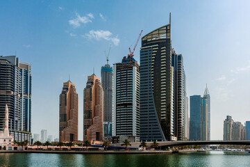 Fototapeta na wymiar Daytime cityscape of Dubai, modern architecture of Dubai Marina area