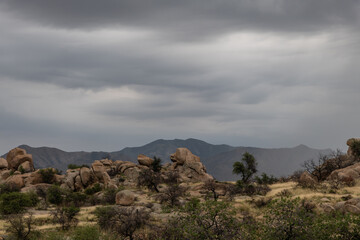 Scenic rock formation in south east Arizona under dramatic monsoonal sky